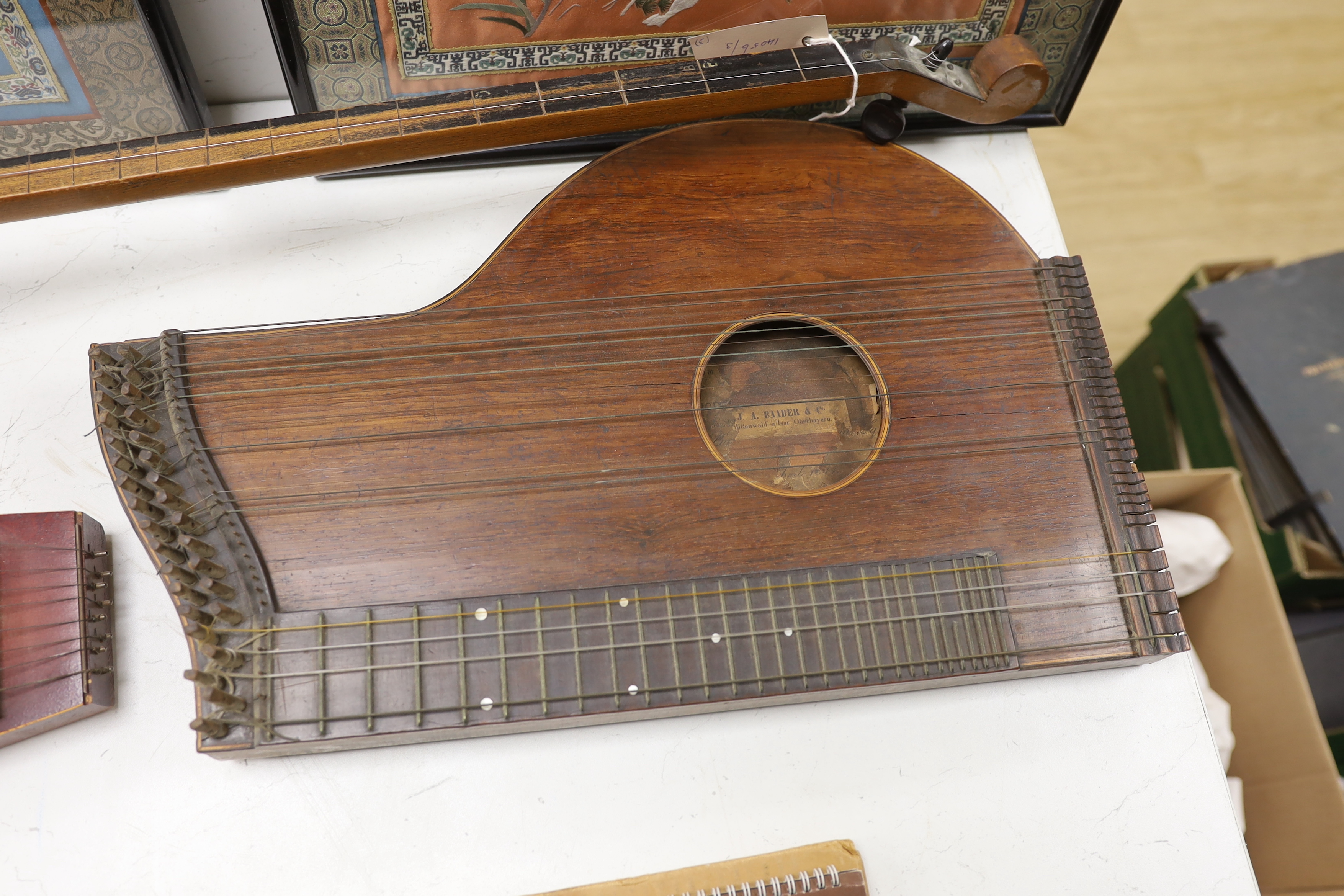 A single string fiddle, a zither and a Golden Music zither